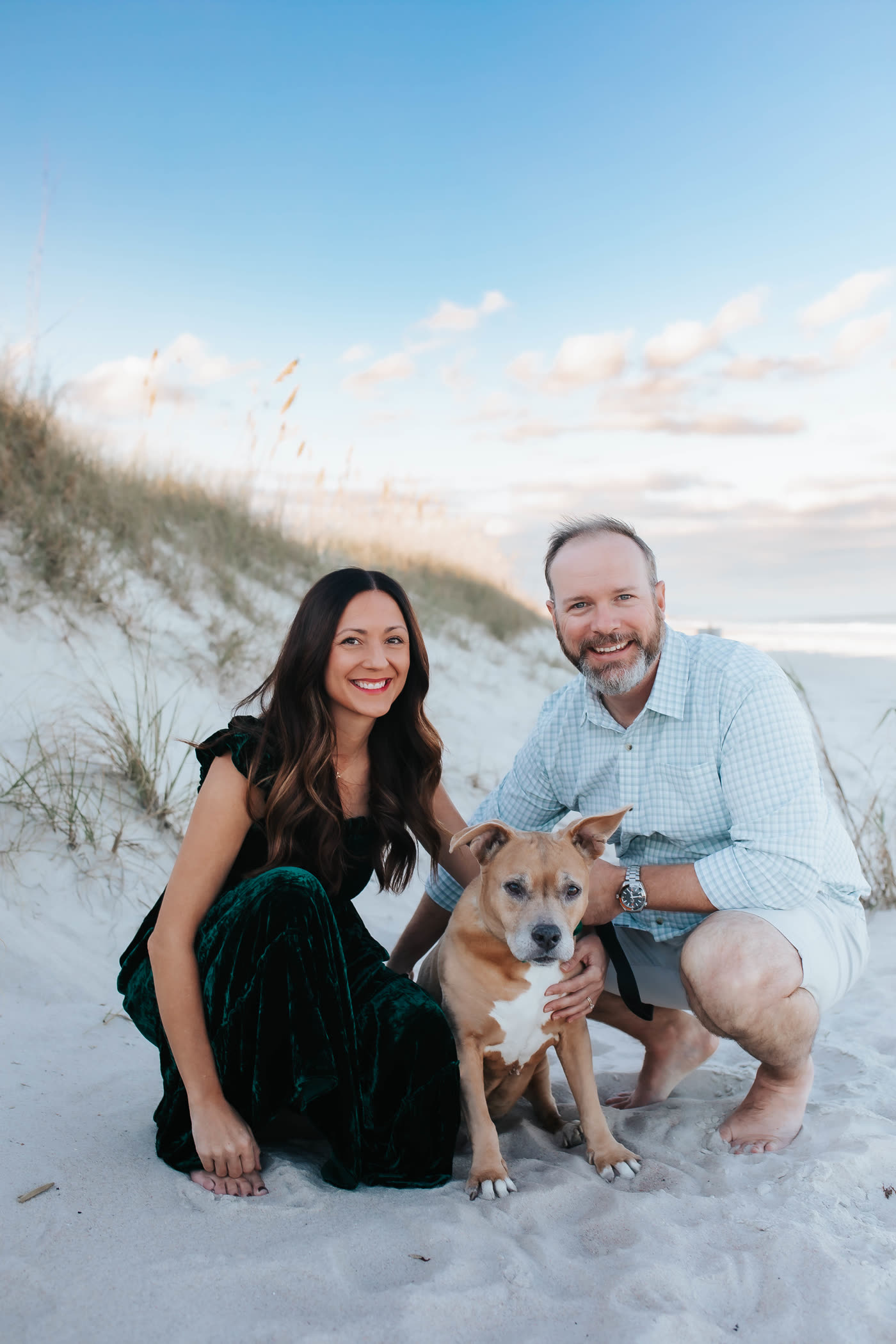Alie, Matt, and Penny the dog on the beach